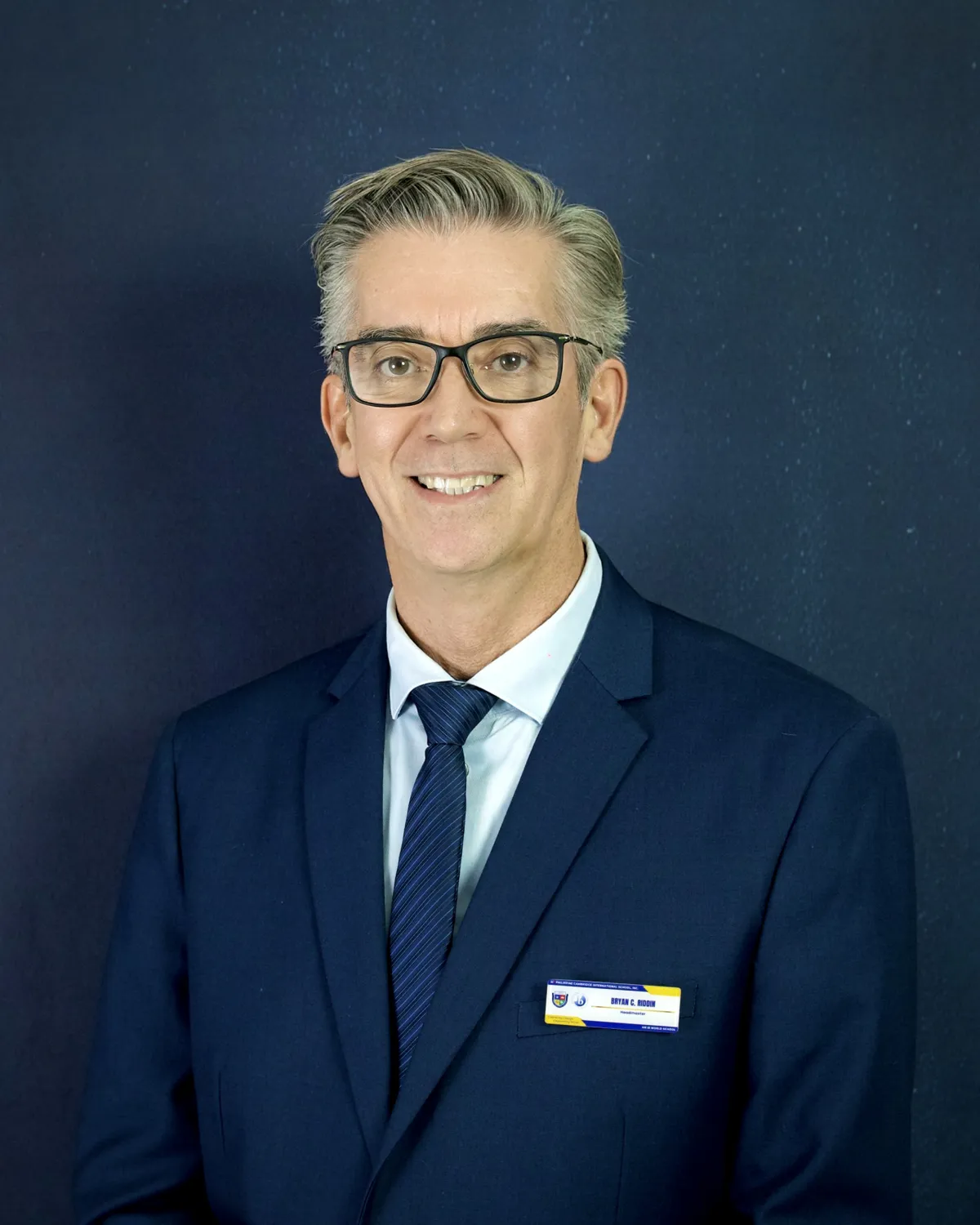 Bryan Riddin, Headmaster of PCIS