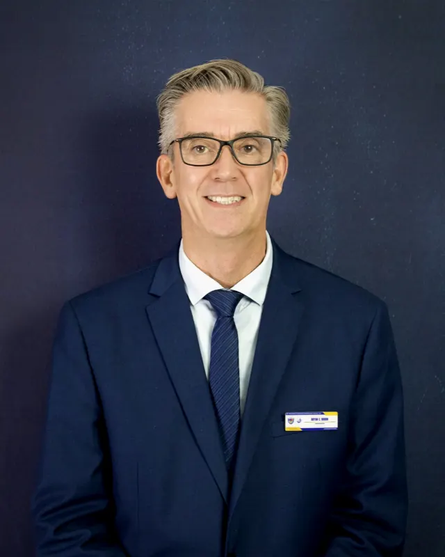 Bryan Riddin — Headmaster
